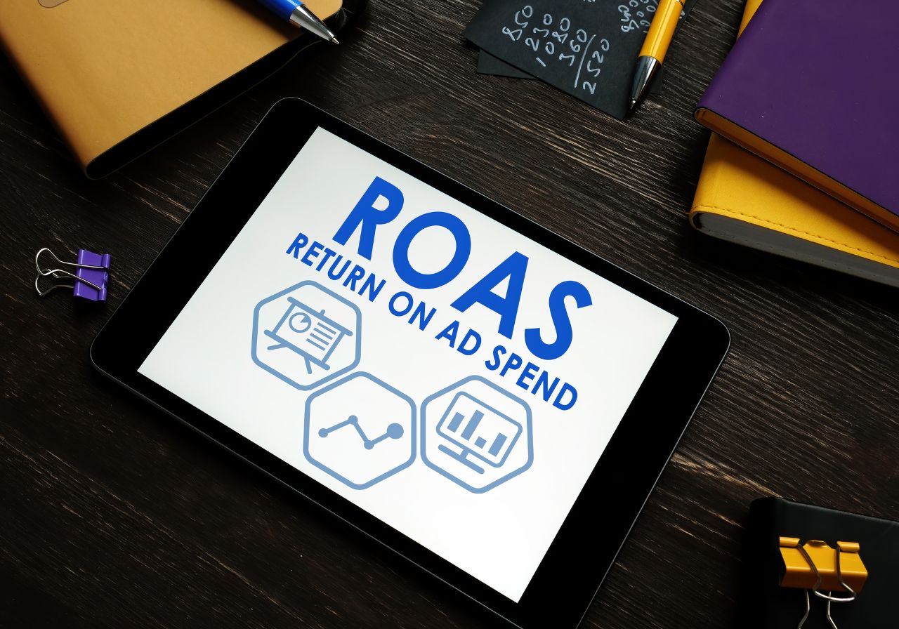 Laptop showing return on ad spend (ROAS) growth chart